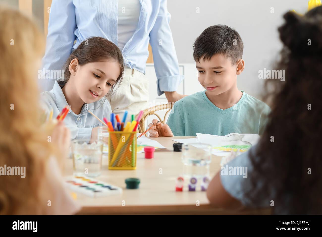 Cute children painting during master-class in art Stock Photo