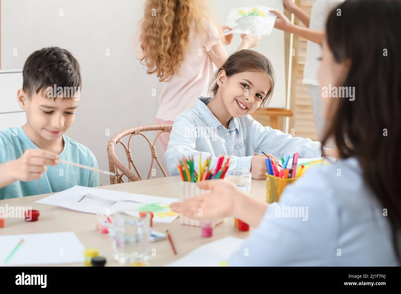 Cute children painting during master-class in art Stock Photo