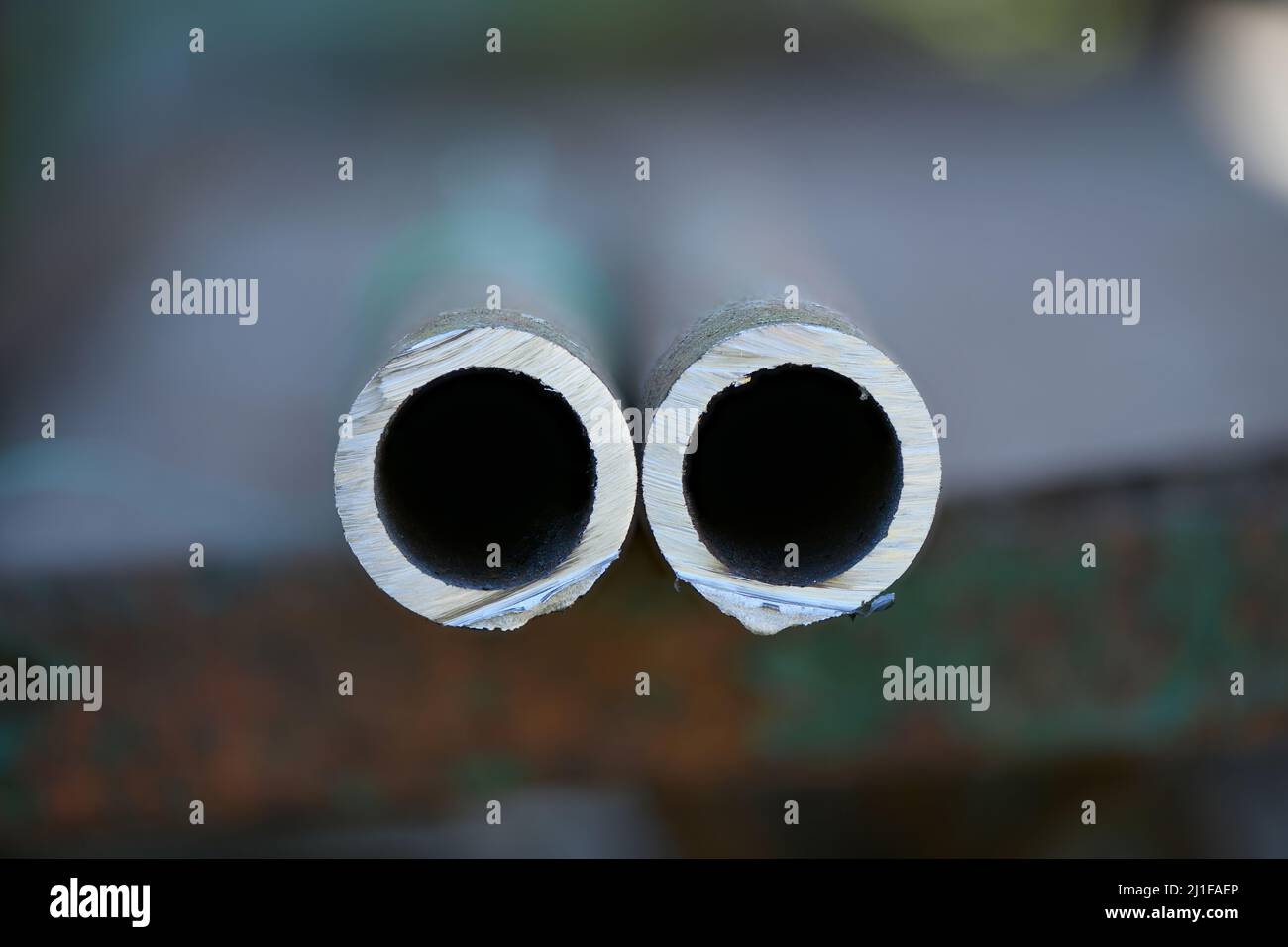 Metal pipe cutting. Cut metal pipe with a grinder. High resolution