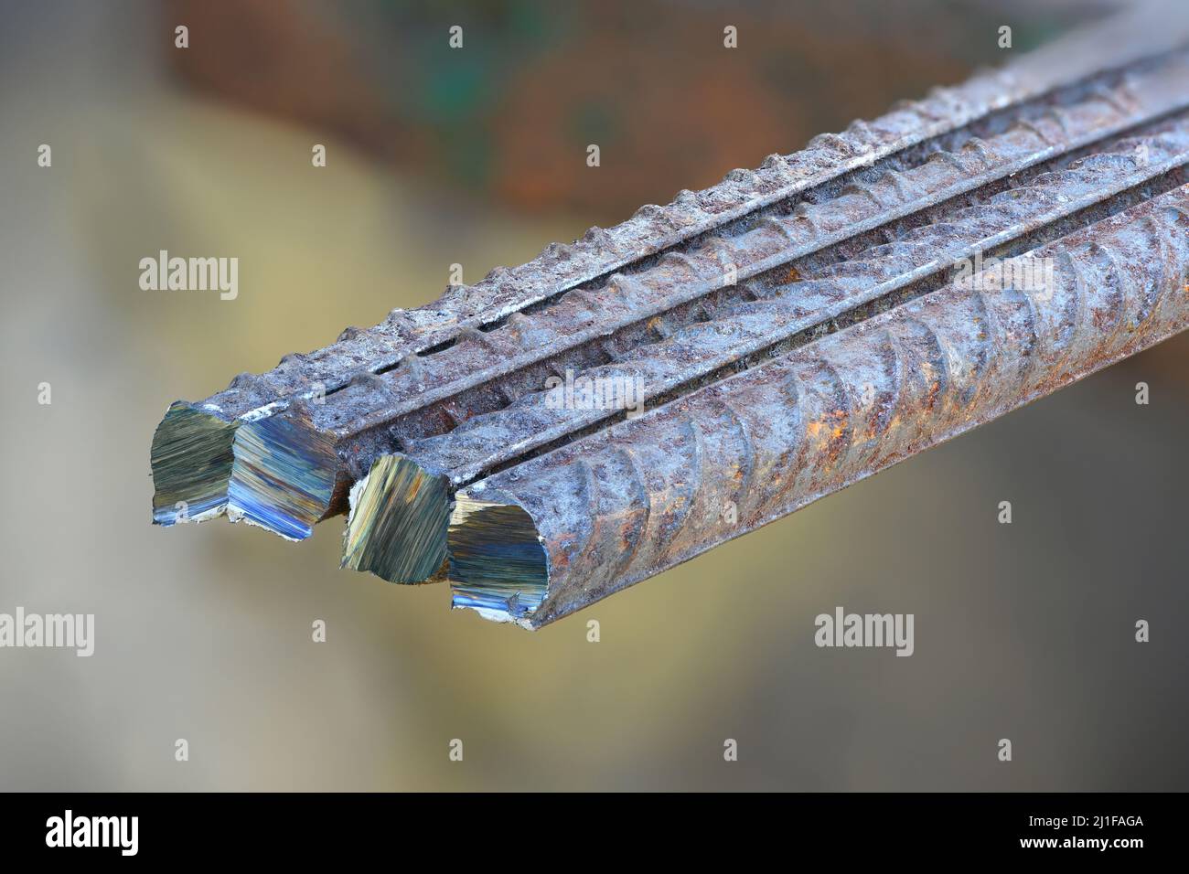 Metal bar cutting. A metal bar cut by a grinder. High resolution photo