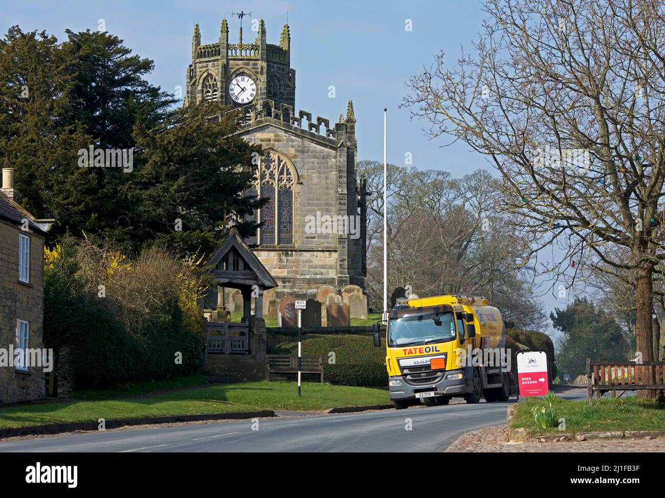 Tate oil lorry, delivering domestic heating oil to house in the village