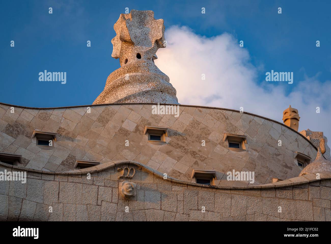 Casa Milà (La Pedrera) at sunset, twilight and blue hour on the Passeig de Gracia in Barcelona (Catalonia, Spain) ESP: La Casa Milà al atardecer (BCN) Stock Photo