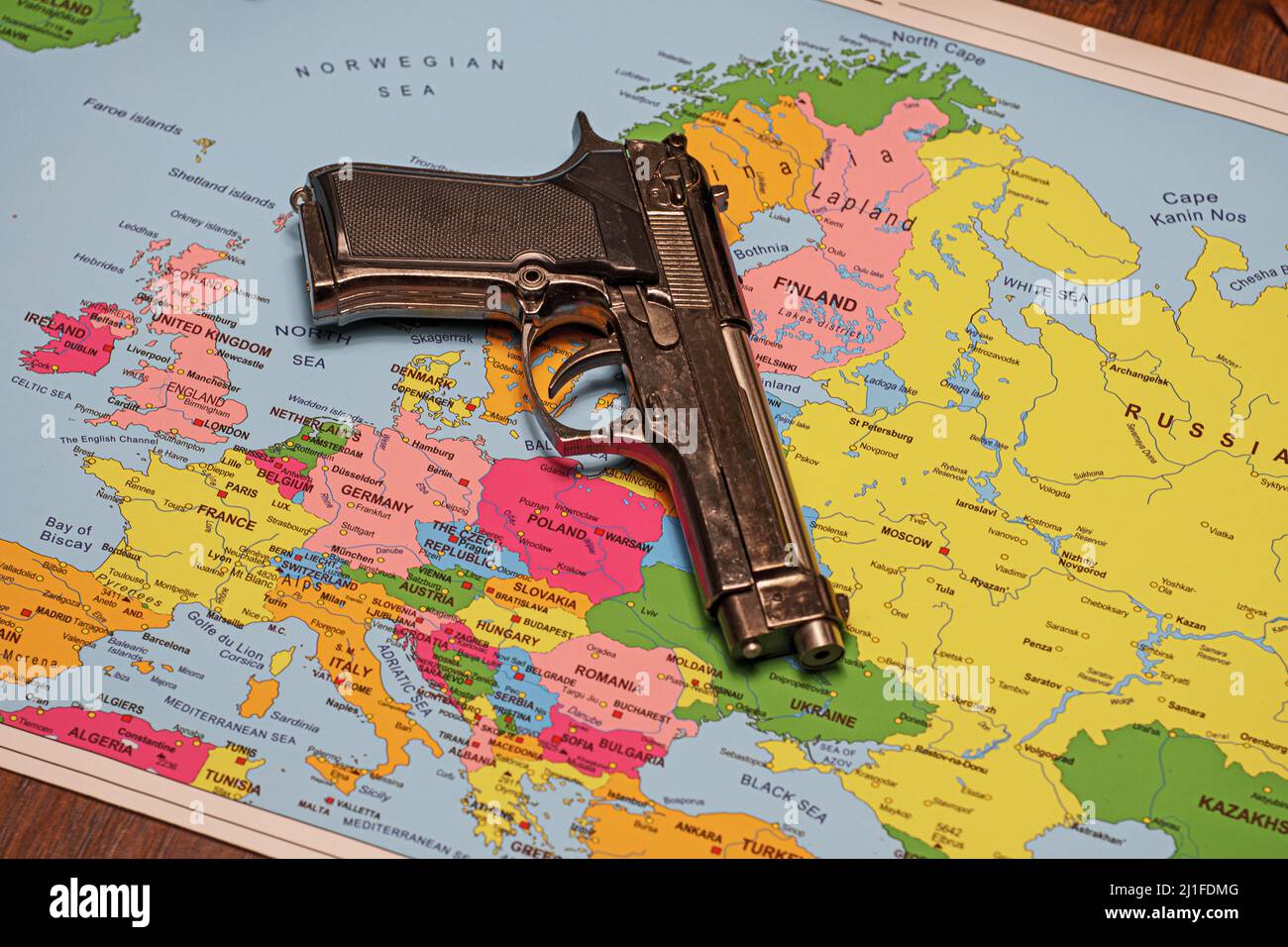 Gun on the map. Concept of military action in Europe Stock Photo Alamy