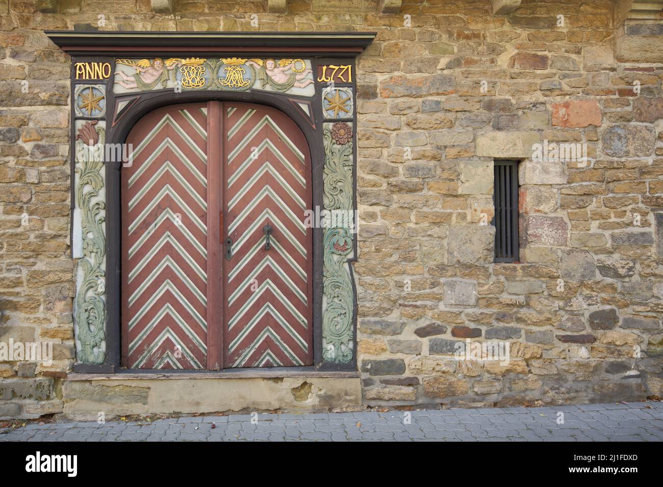 Decorated door with year on the flank tower in Goslar, Lower Saxony, Germany Stock Photo