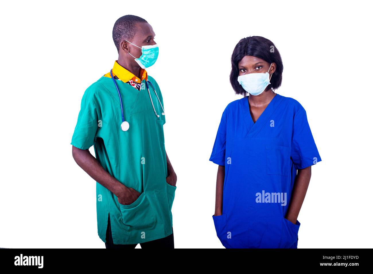 Doctors In Uniform a group of doctors in uniform standing on white background wearing ...