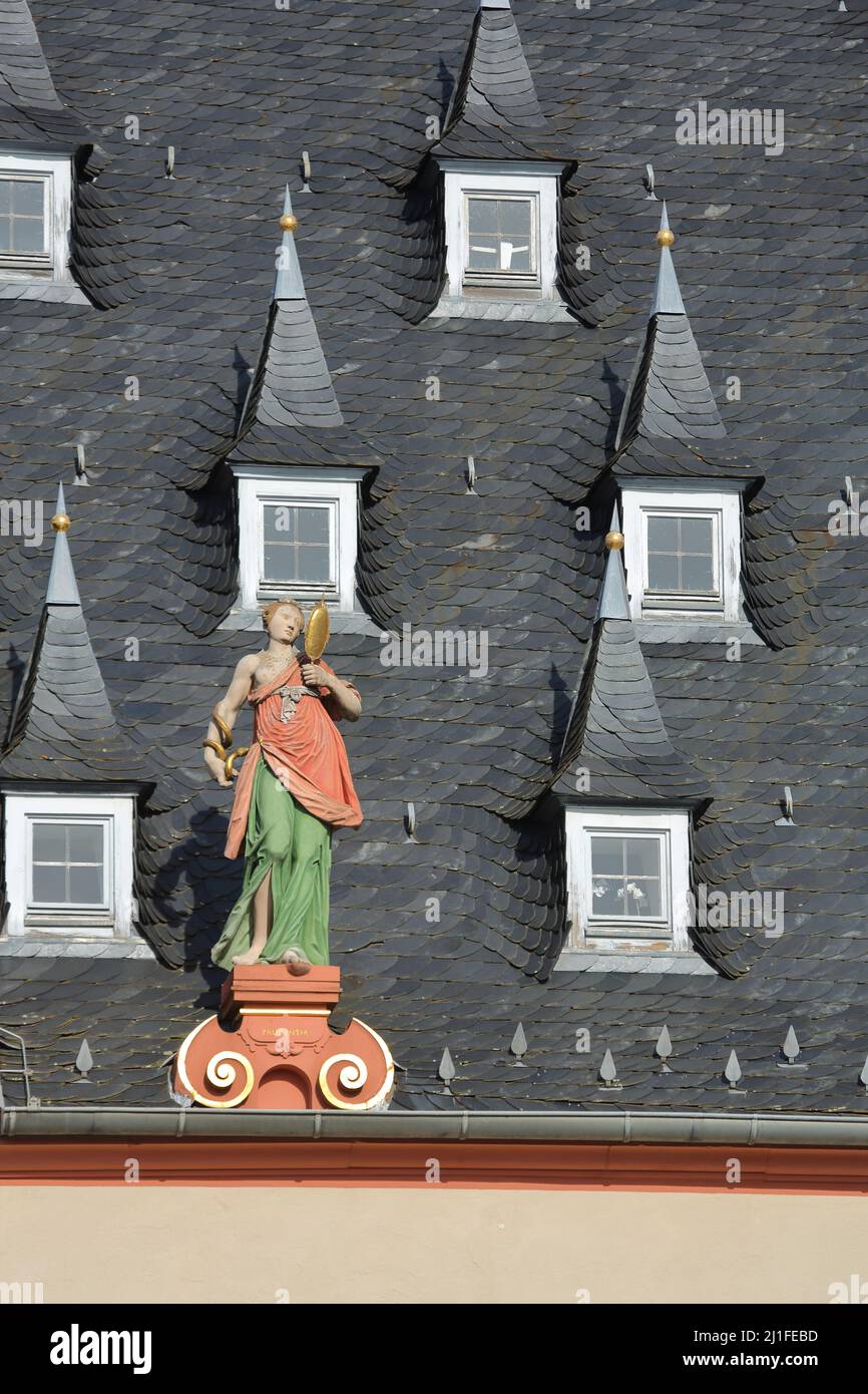 Prudentia Allegory of Prudence on the roof of the town hall in Groß-Umstadt, Hesse, Germany Stock Photo