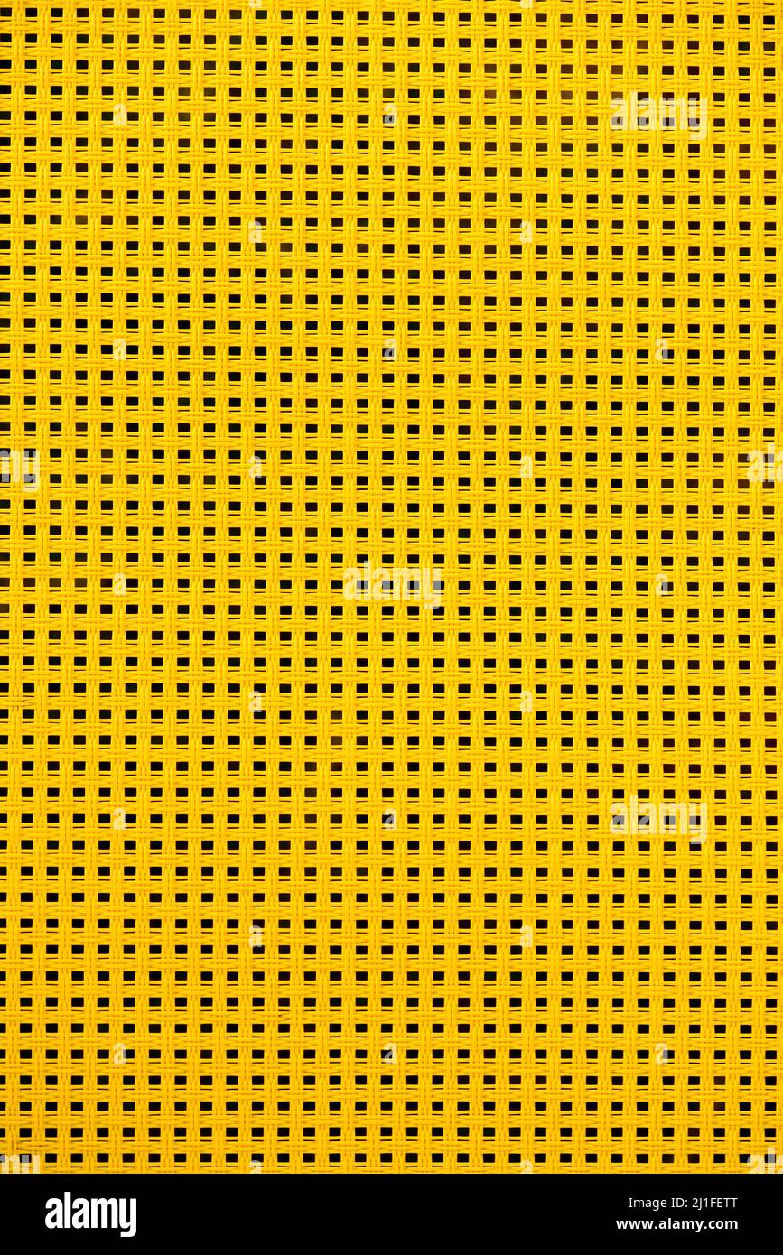 yellow plastic raffia pool chair texture pattern Stock Photo