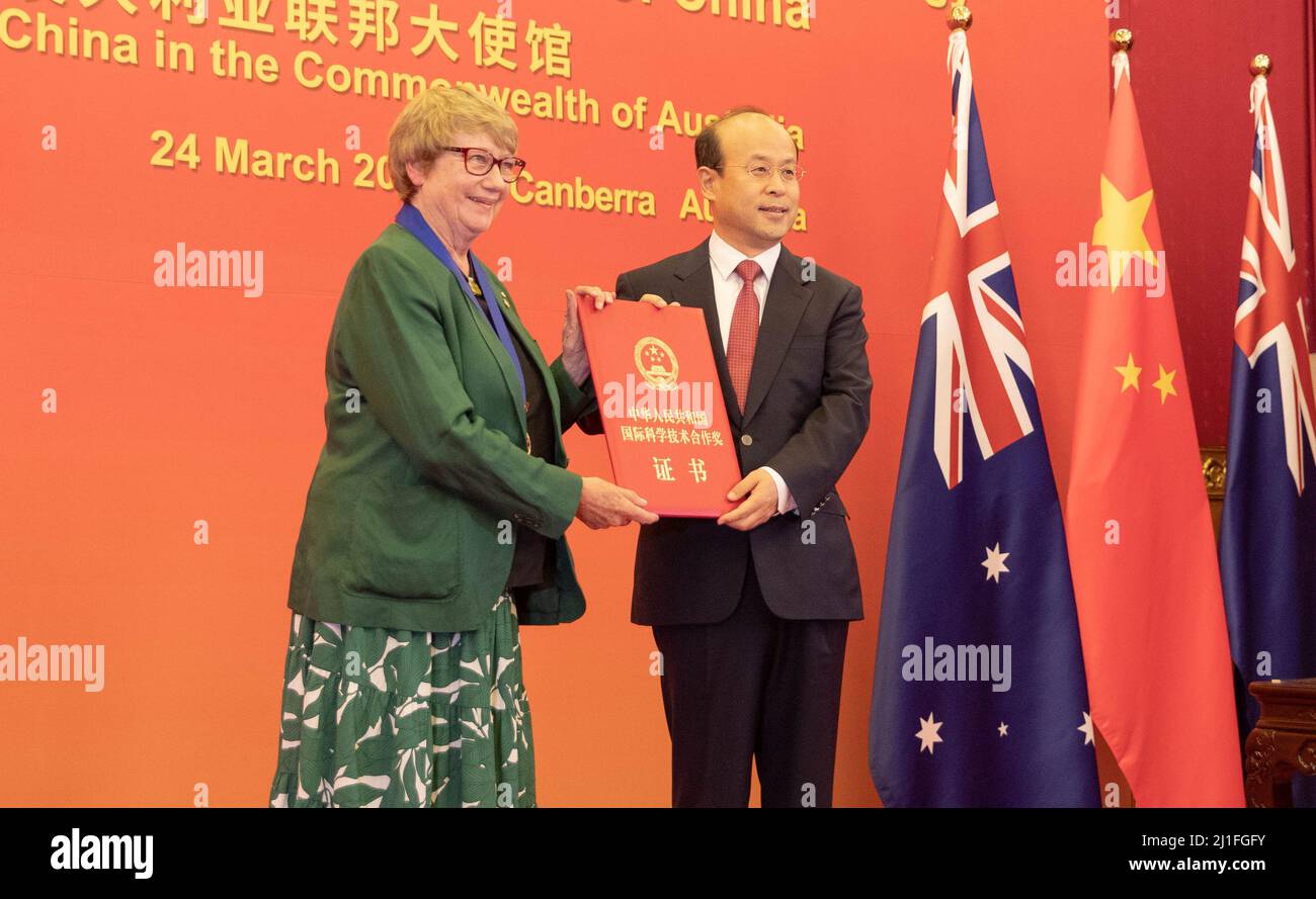 (220325) -- CANBERRA, March 25, 2022 (Xinhua) -- Chinese Ambassador to Australia Xiao Qian (R) presents the International Science and Technology Cooperation Award to Australian geoscientist Sue O'Reilly in Canberra, Australia, March 24, 2022.  China has granted O'Reilly the International Science and Technology Cooperation Award on Thursday.    At the presentation ceremony hosted in the Chinese Embassy in Australia, O'Reilly, Fellow of the Australian Academy of Science and Professor of the Macquarie University, received the award from Chinese Ambassador Xiao Qian.   TO GO WITH 'Australian scien Stock Photo