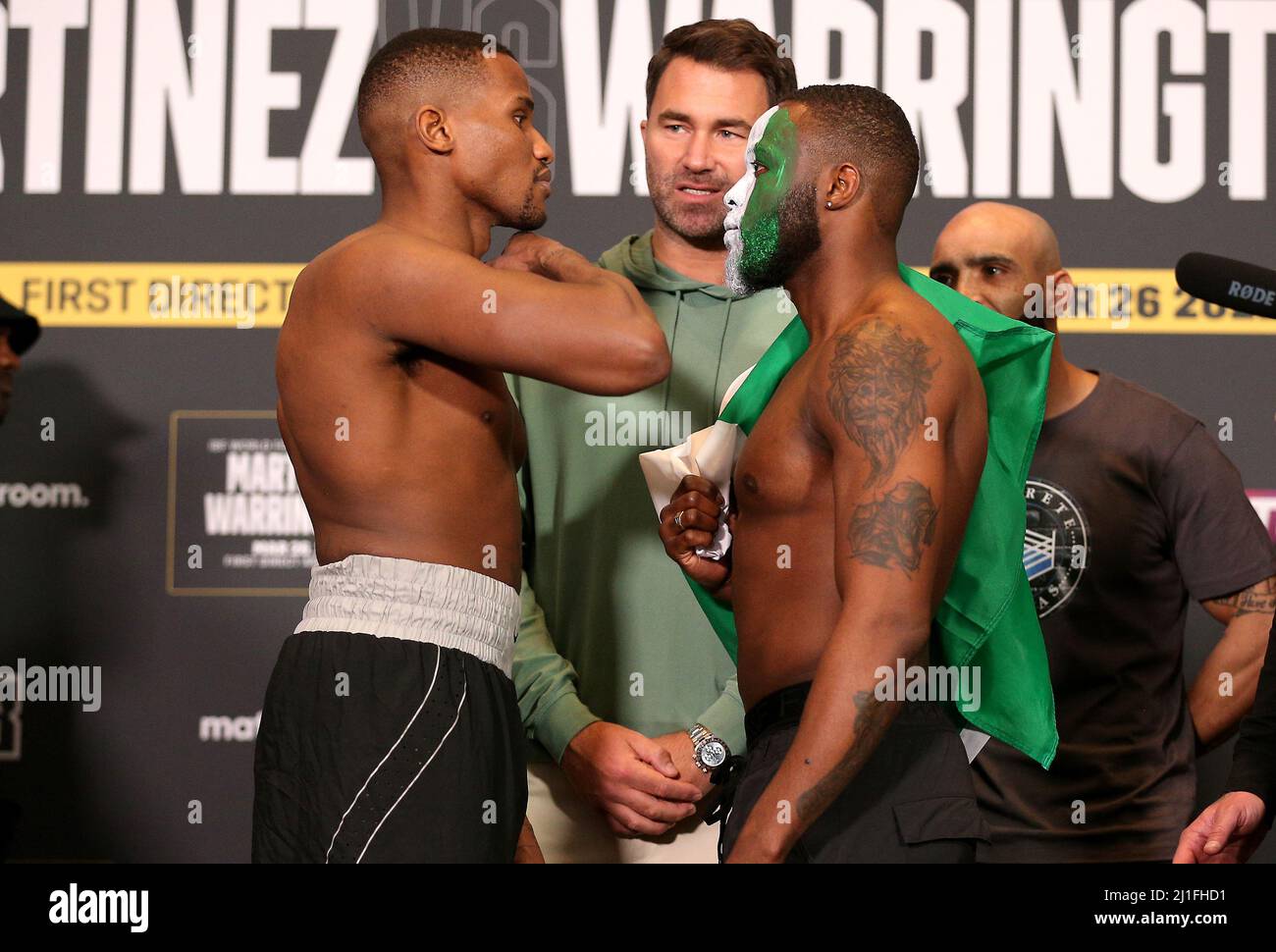 Mali Wright (left) and Luis Palmer face off as Eddie Hearn looks on