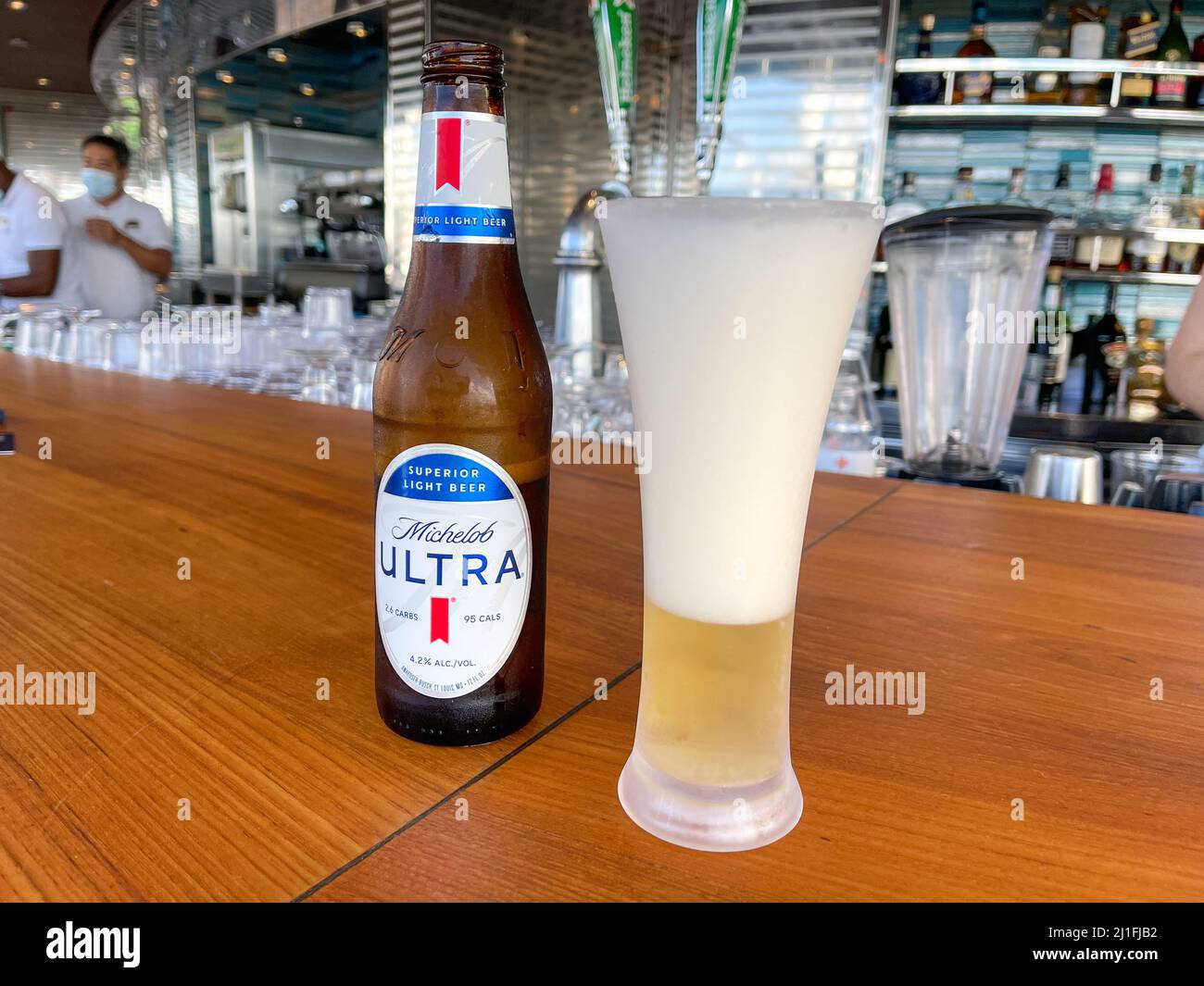 Orlando, FL USA - October 10, 2021:  A Michelob Ultra beer at an outdoor bar on the MSC Cruise Ship Divina in Port Canaveral, Florida. Stock Photo