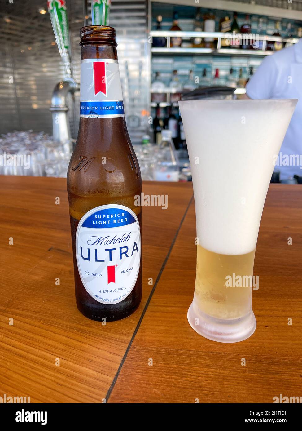 Orlando, FL USA - October 10, 2021:  A Michelob Ultra beer at an outdoor bar on the MSC Cruise Ship Divina in Port Canaveral, Florida. Stock Photo