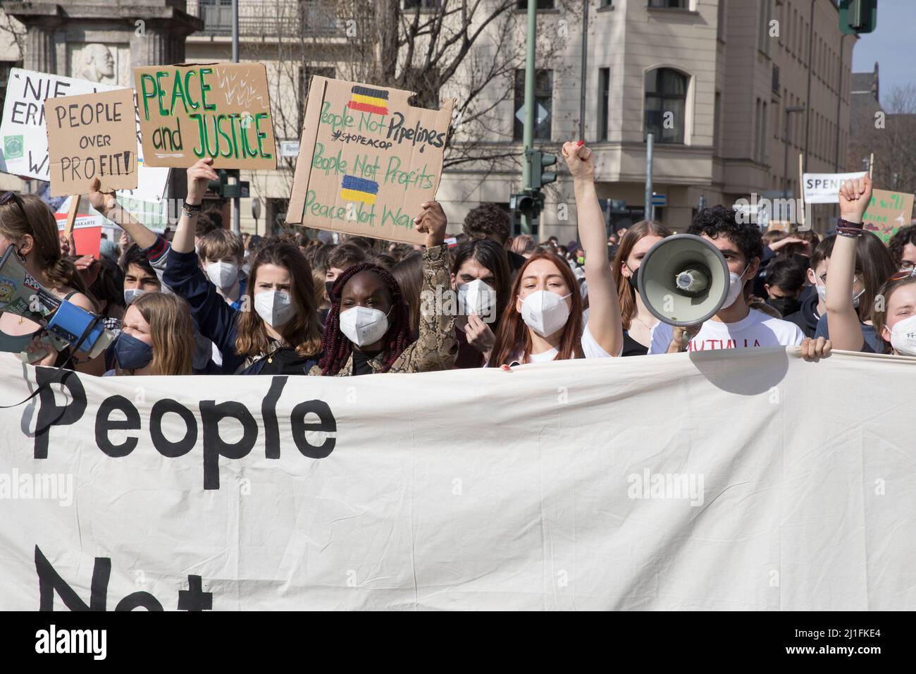 Berlin, Germany. 25th Mar, 2022. Protesters took to the streets in Berlin on March 25, 2022, to call for urgent action on climate change. The colorful climate demonstration in Berlin brought out protesters of all ages. The Fridays for Future climate movement calls attention to the current Russian war in Ukraine. (Credit Image: © Michael Kuenne/PRESSCOV via ZUMA Press Wire) Stock Photo