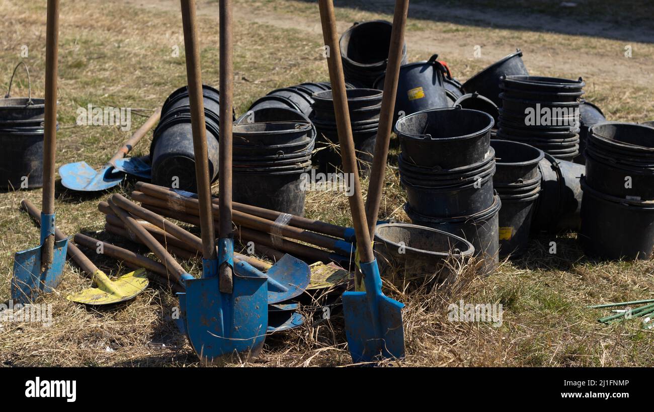 Shovels and buckets for planting trees Stock Photo Alamy