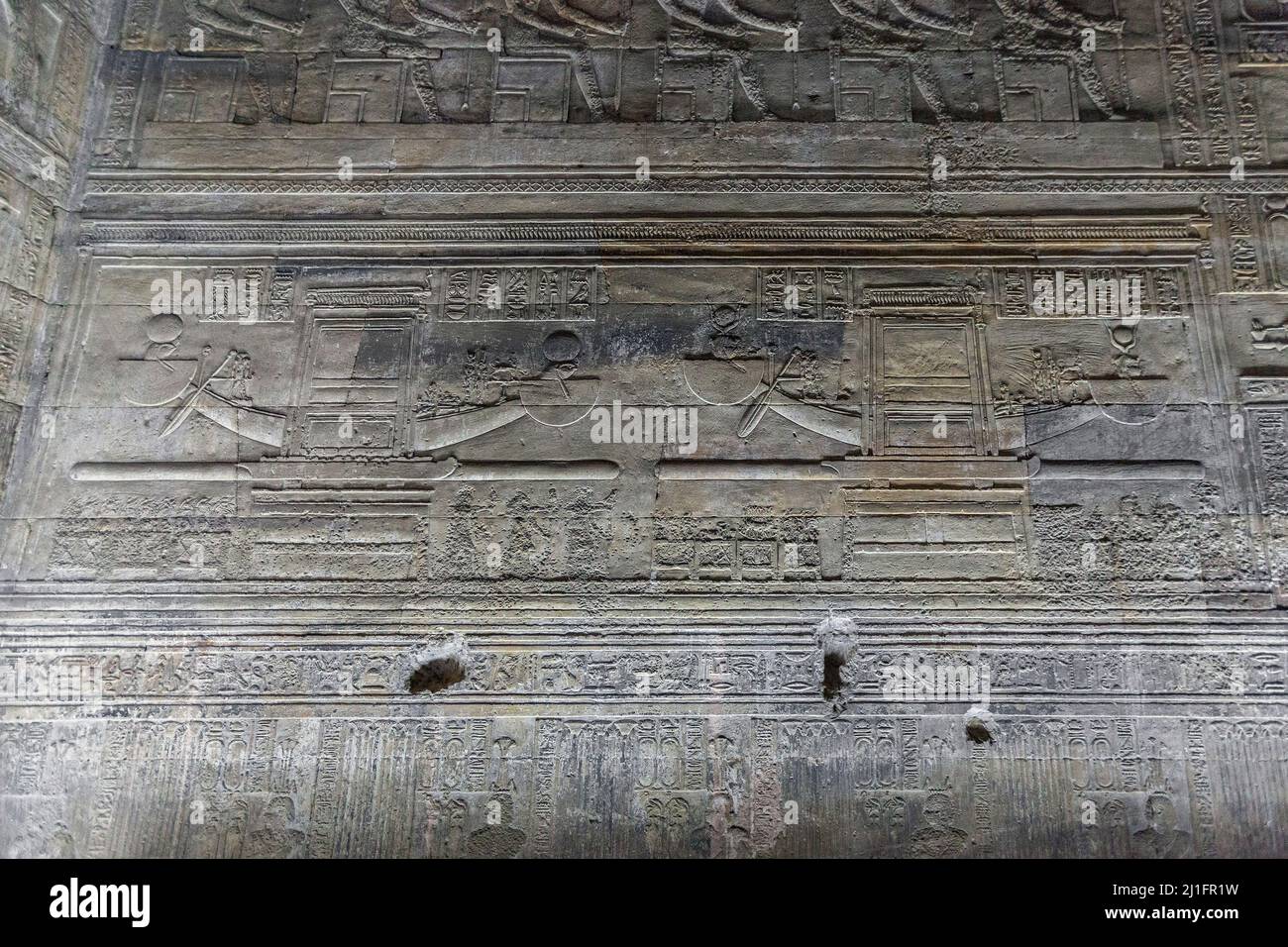 Wall carvings in the crypt of the Temple of Hathor, Dendera Stock Photo ...