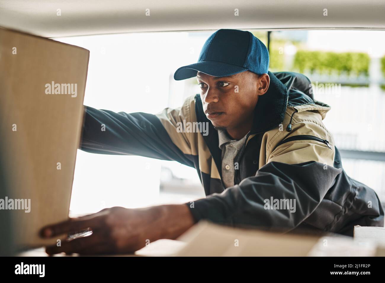 Hitting the road with a new batch of deliveries. Shot of a courier