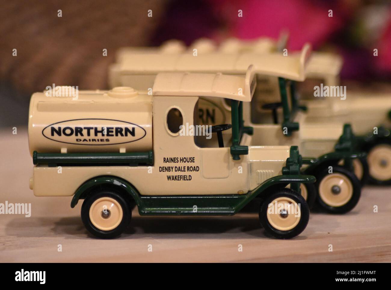 Days gone made in England 3 model set of Northern Dairies model T Ford tanker, Delivery truck with milk churns in cream and green Stock Photo