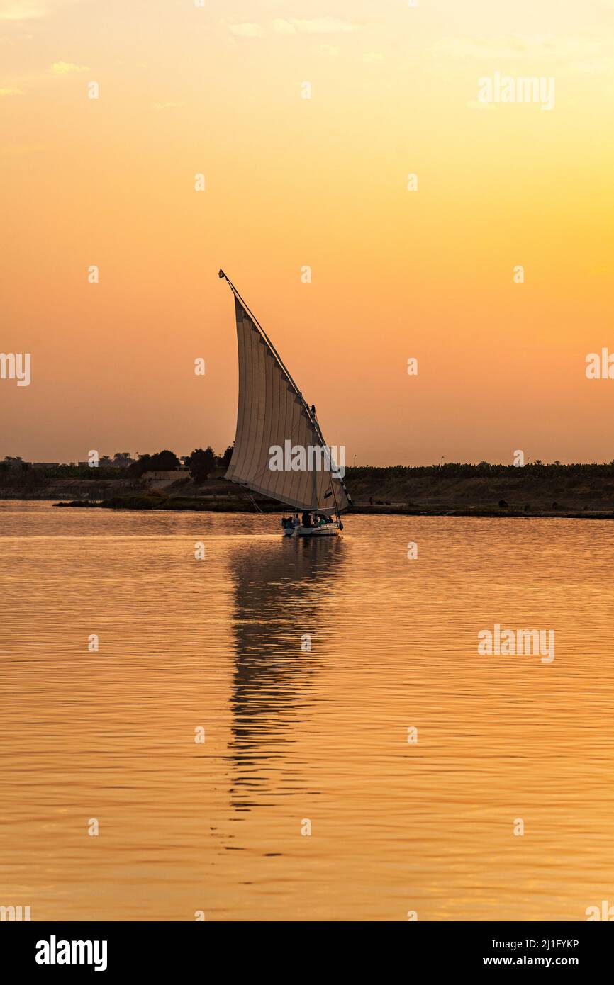Sunset on the Nile with felucca, Luxor Stock Photo