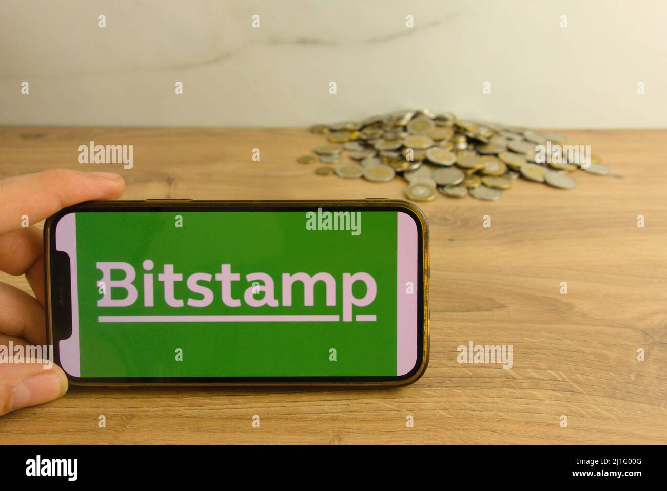 KONSKIE, POLAND - March 20, 2022: Bitstamp cryptocurrency exchange logo on mobile phone. Online trading, blockchain technology concept Stock Photo