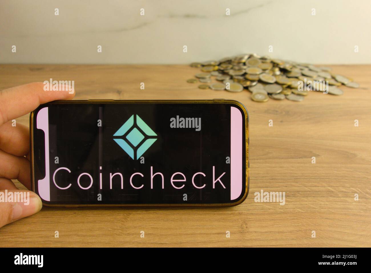 KONSKIE, POLAND - March 20, 2022: Coincheck cryptocurrency exchange logo on mobile phone. Online trading, blockchain technology concept Stock Photo