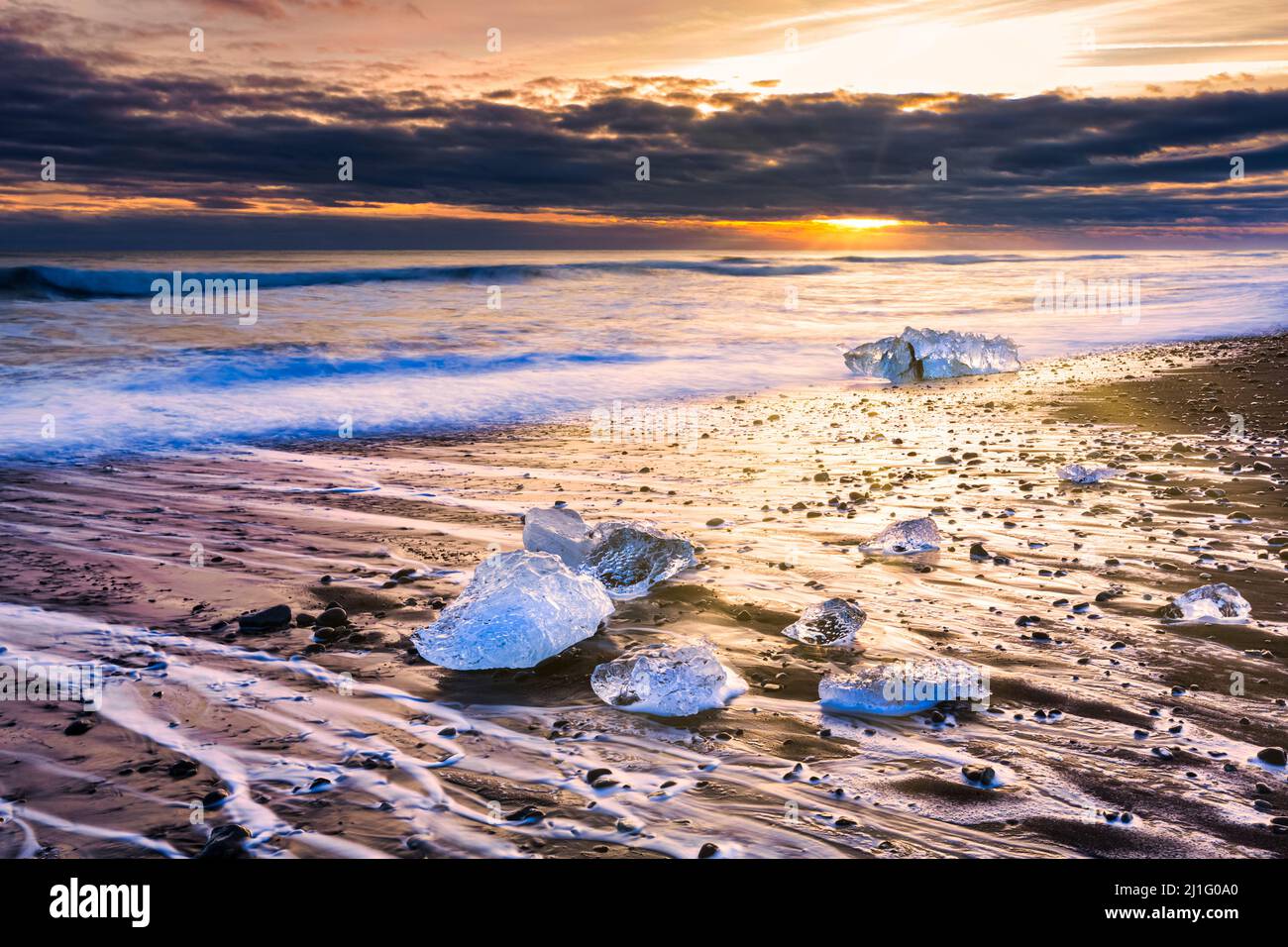 Sunset at Diamond beach, in Jokulsarlon, Iceland. Stock Photo