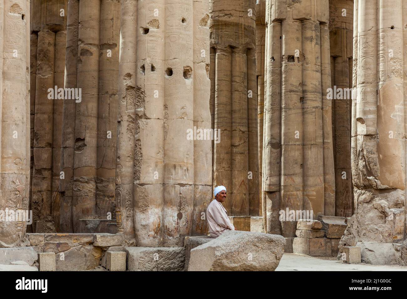 Local Man Sitting Amidst The Papyrus Columns Of The Sun Court Of 