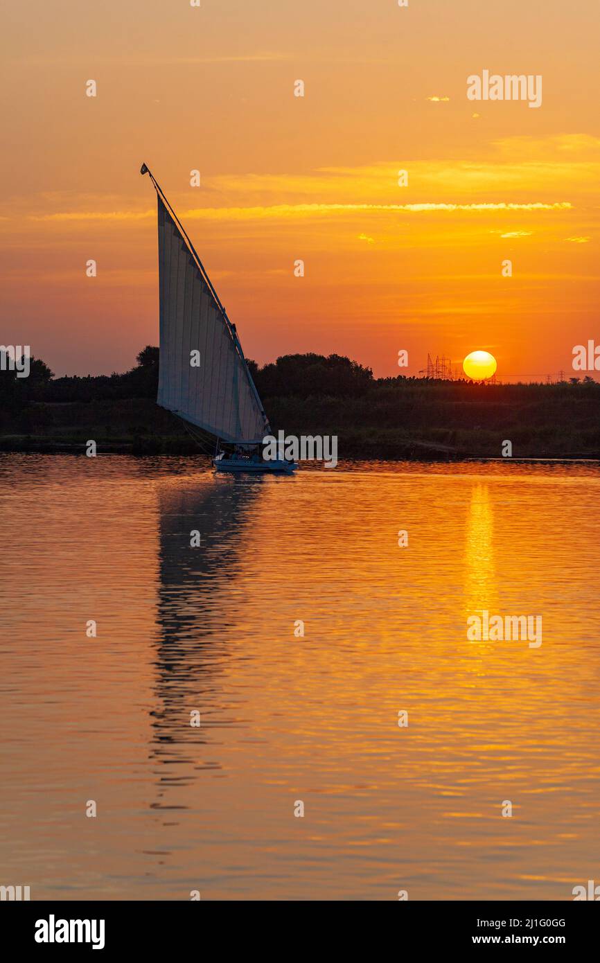 Sunset on the Nile with felucca, Luxor Stock Photo