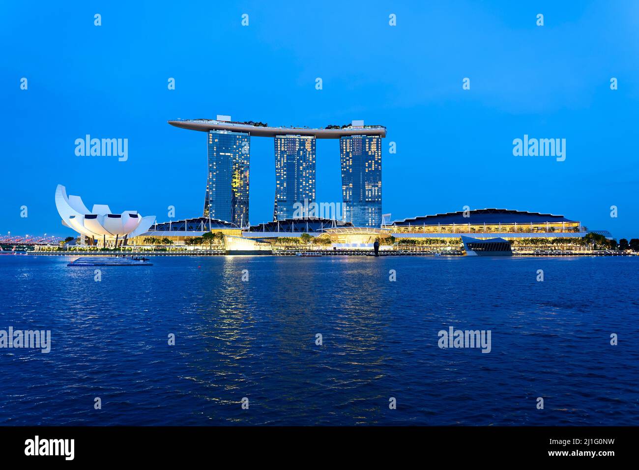 Singapore. Marina Bay. The Merlion. Marina Bay Sands Hotel at sunset ...