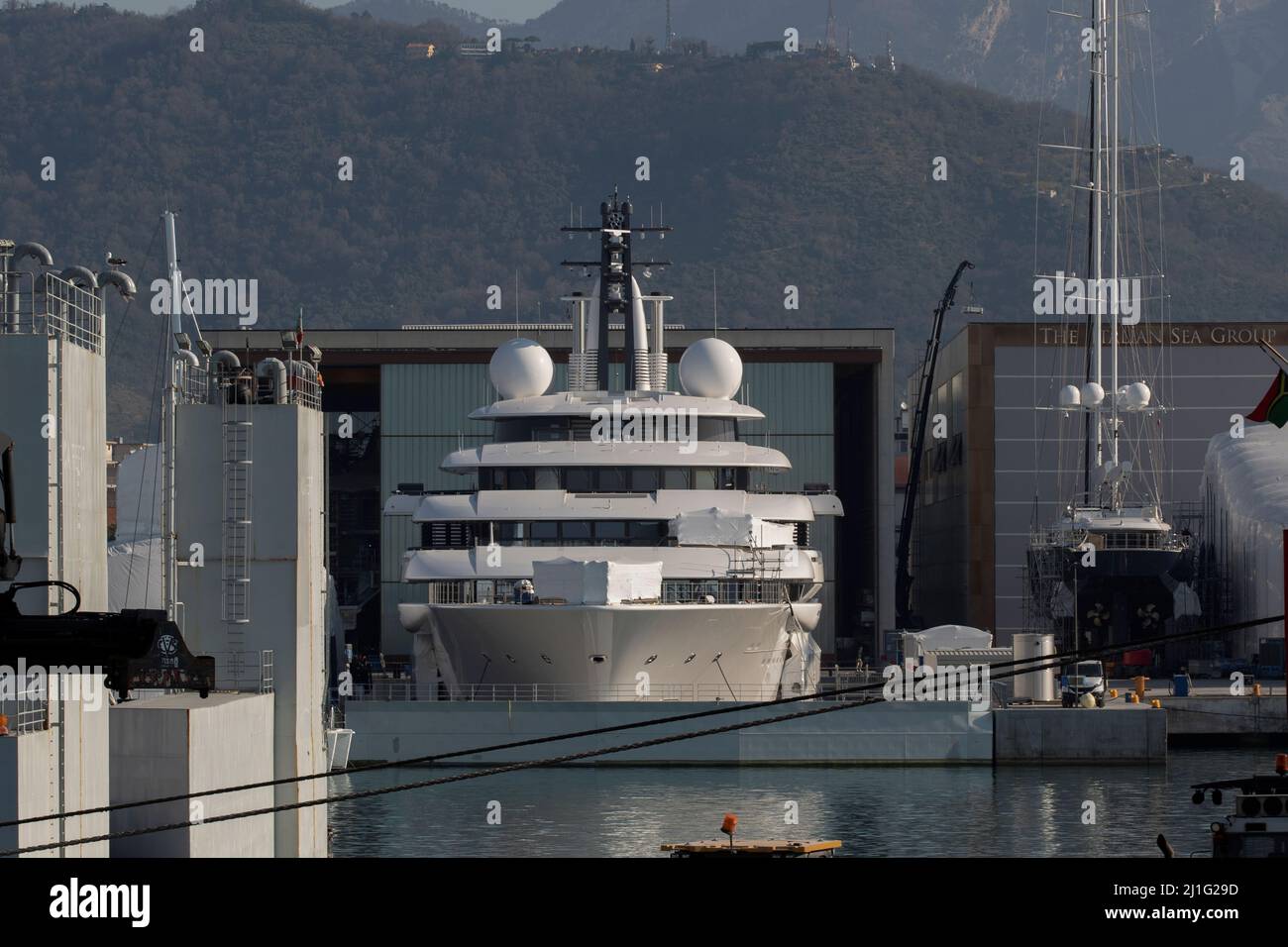 Massa Carrara, Italy. 25th Mar, 2022. Massa Carrara, Italy Scheherazade the presumed yacht of Vladimir Putin president of Russia moored in the shipyard of the Italian Sea Group in Marina di Massa where the ordinary maintenance works are proceeding by various workers In the picture: the yacht Scheherazade in the yard Credit: Independent Photo Agency/Alamy Live News Stock Photo