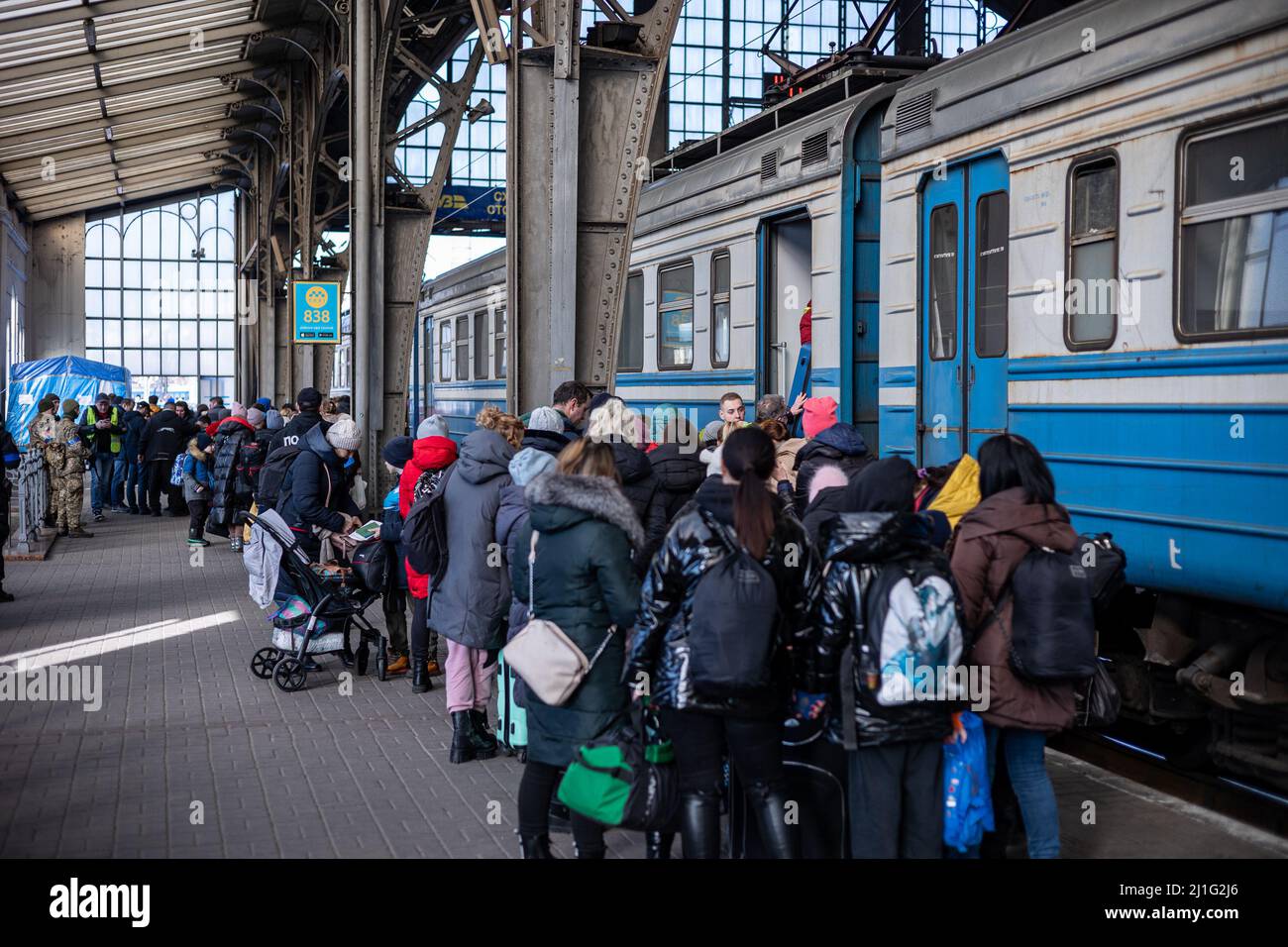 LVIV, UKRAINE - March 14, 2022: Humanitarian catastrophe during at russian aggression war against Ukraine. Refugees from the war-torn territories are Stock Photo