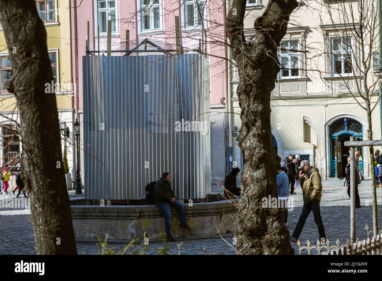 LVIV, UKRAINE - March 20, 2022: Protective structures for protection in case of bombing - statues of fountains of Diana, Neptune, Amphitrides and Adon Stock Photo
