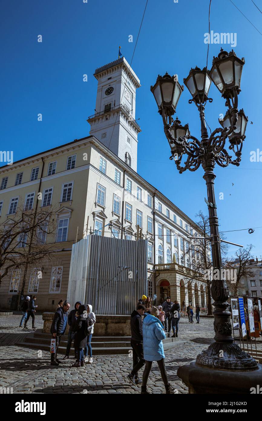 LVIV, UKRAINE - March 20, 2022: Protective structures for protection in case of bombing - statues of fountains of Diana, Neptune, Amphitrides and Adon Stock Photo