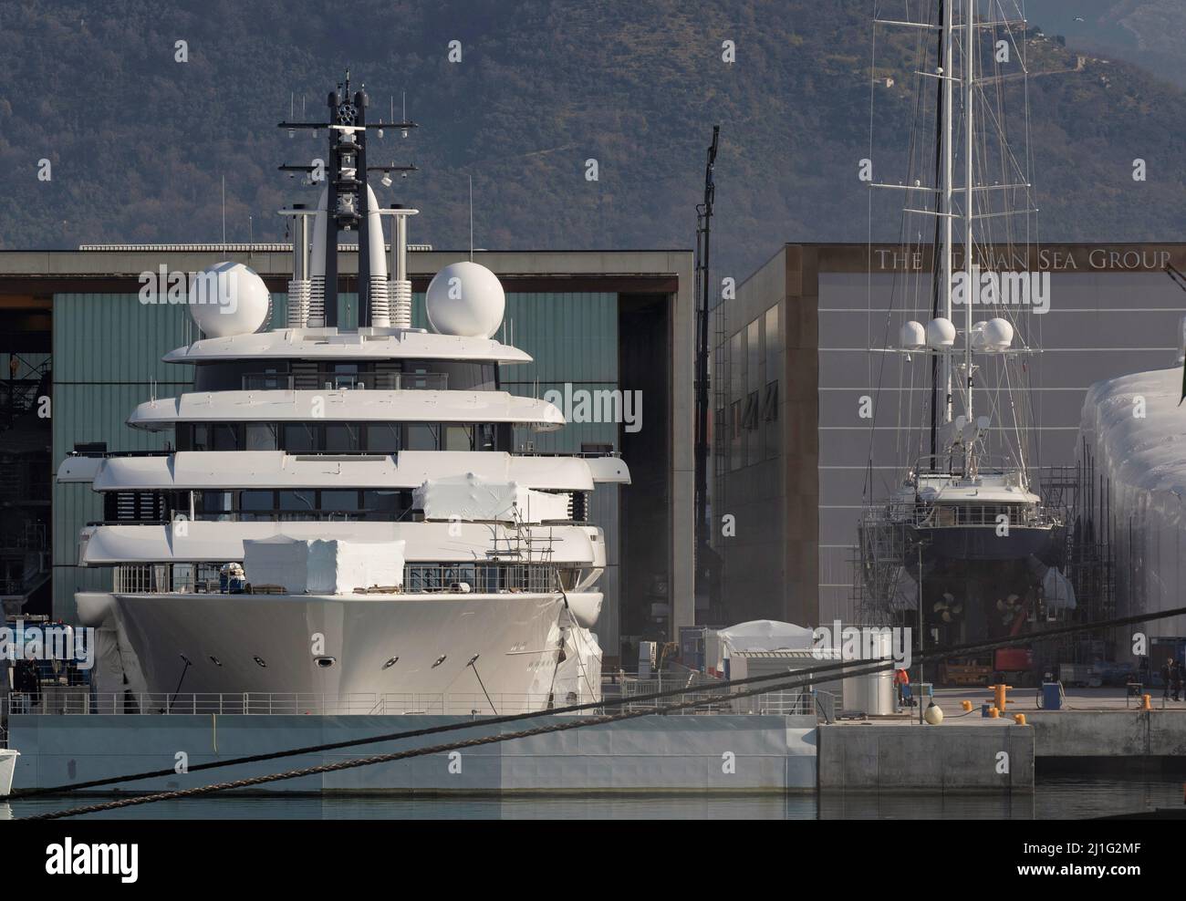 Massa Carrara, Italy. 25th Mar, 2022. Massa Carrara, Italy Scheherazade the presumed yacht of Vladimir Putin president of Russia moored in the shipyard of the Italian Sea Group in Marina di Massa where the ordinary maintenance works are proceeding by various workers In the picture: the yacht Scheherazade in the yard Credit: Independent Photo Agency/Alamy Live News Stock Photo