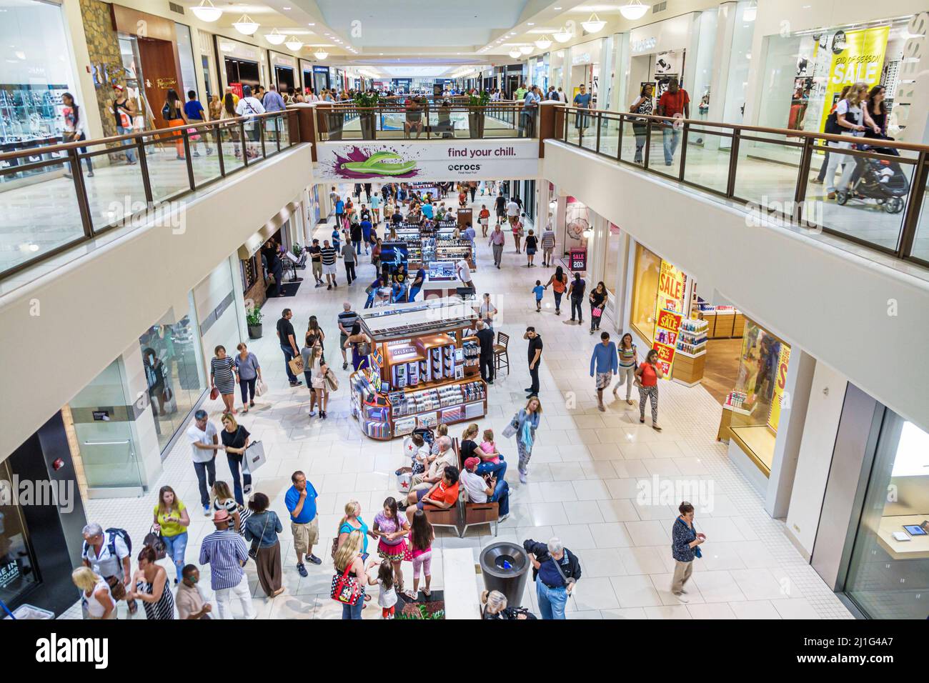 Miami Florida,Aventura Mall,atrium shopping shoppers shops,stores  businesses multi-level indoor inside interior stores kiosks Stock Photo -  Alamy