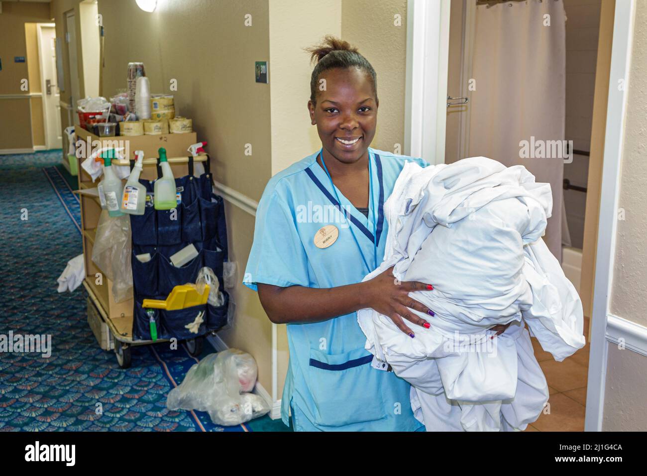 Florida Sebastian Captain Hiram's Resort,hotel motel lobby Black woman female smiling,housekeeping housekeeper employee worker staff working maid serv Stock Photo