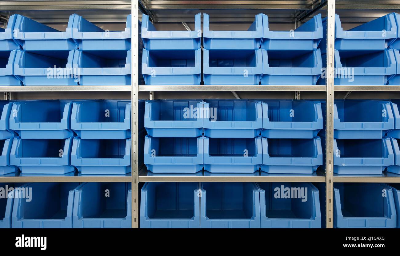 Tool Storage Box and Tool Chests Protective cases for tools and devices. blue plastic Storage boxes on Shelf for accessories or tools set in home offi Stock Photo