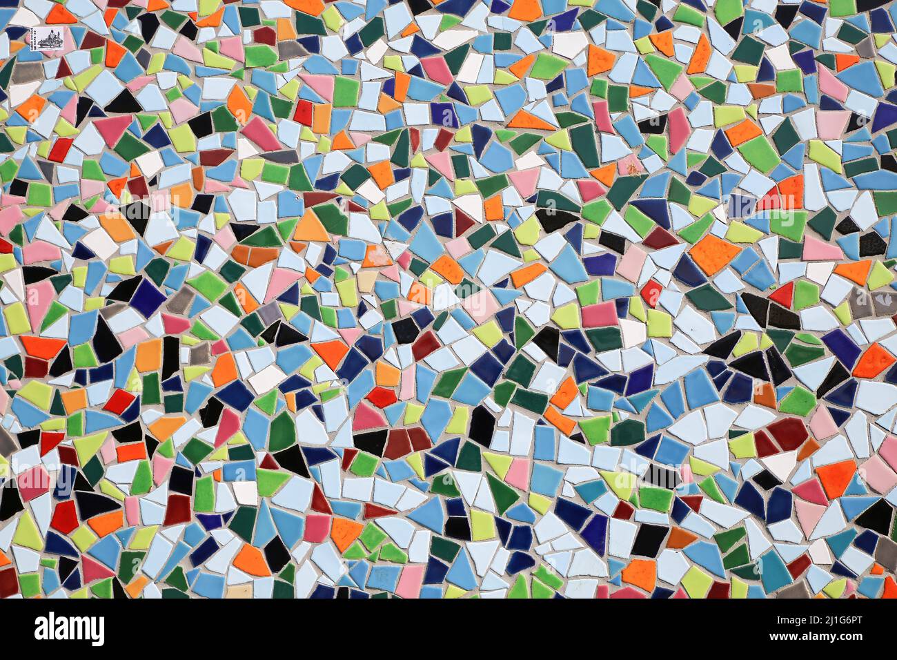 Closeup of ceramic mosaic with countless multicolored tiles with different shapes form a coherent overall picture Stock Photo