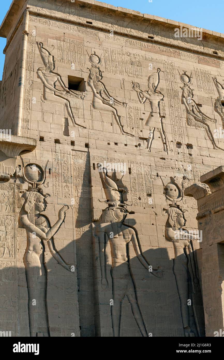 Carvings of Hathor, Isis and Horus on the eastern tower of the first