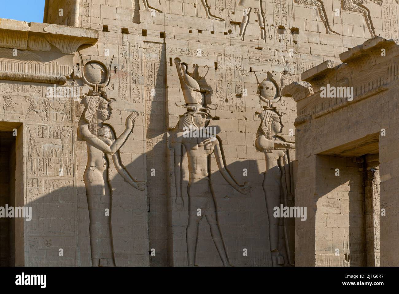 Carvings of Hathor, Isis and Horus on the eastern tower of the first