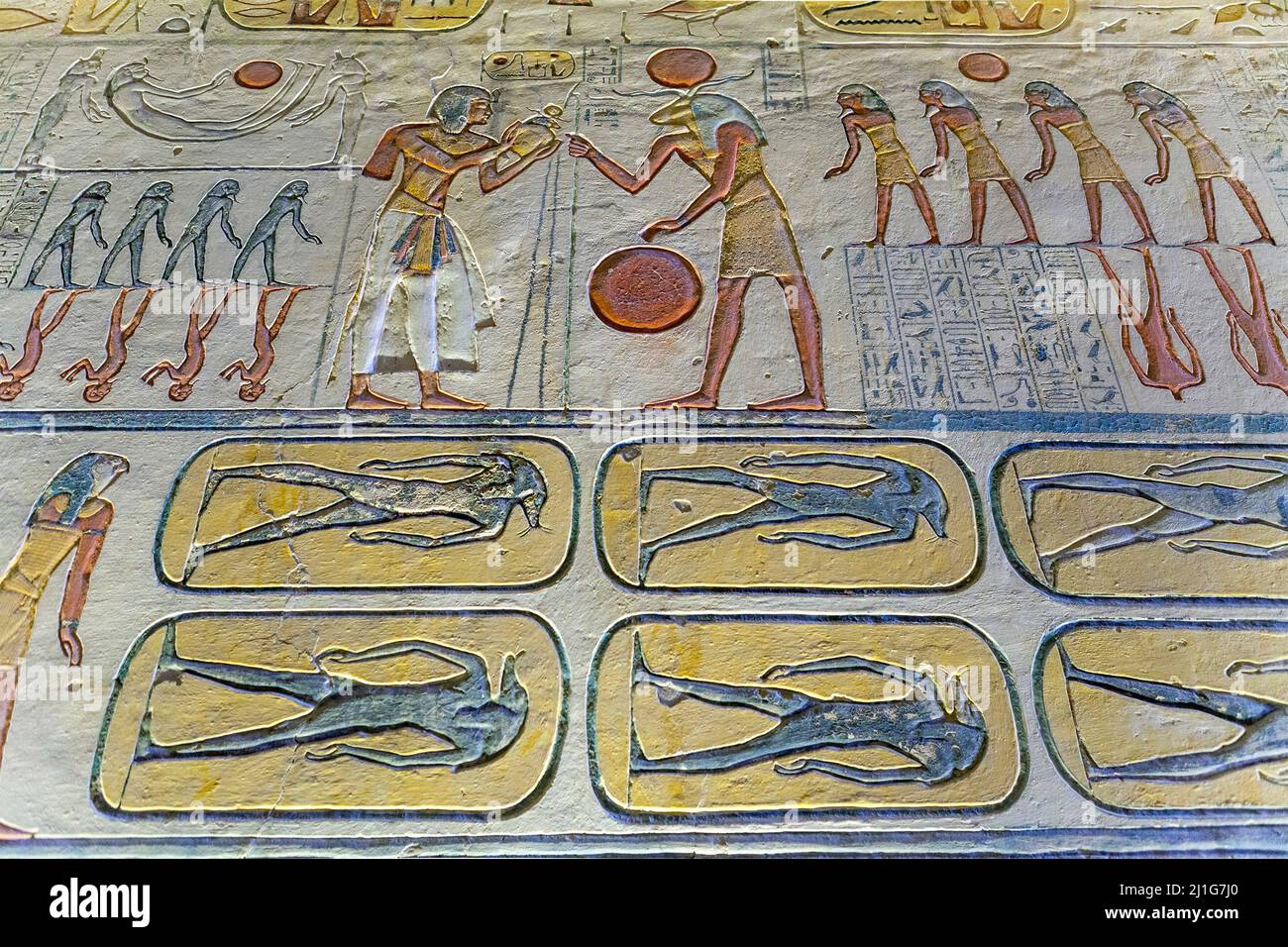 The pharaoh making an offering to Khnum-Ra in the Book of the Caverns, tomb of Ramesses IX, KV6, Valley of the Kings Stock Photo