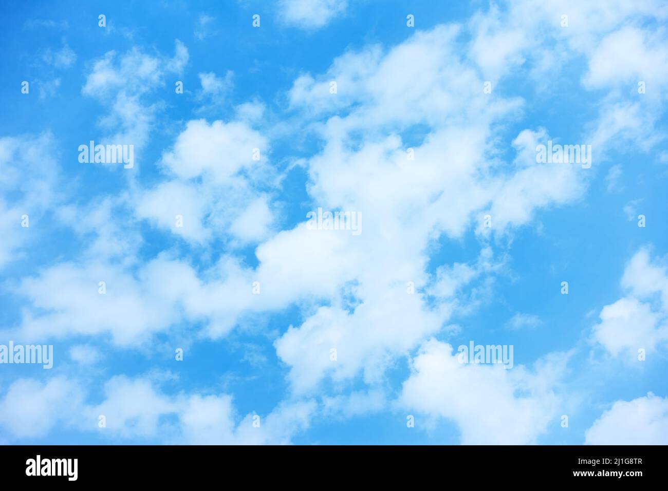 Bright blue sky with clouds - background with copy space Stock Photo ...