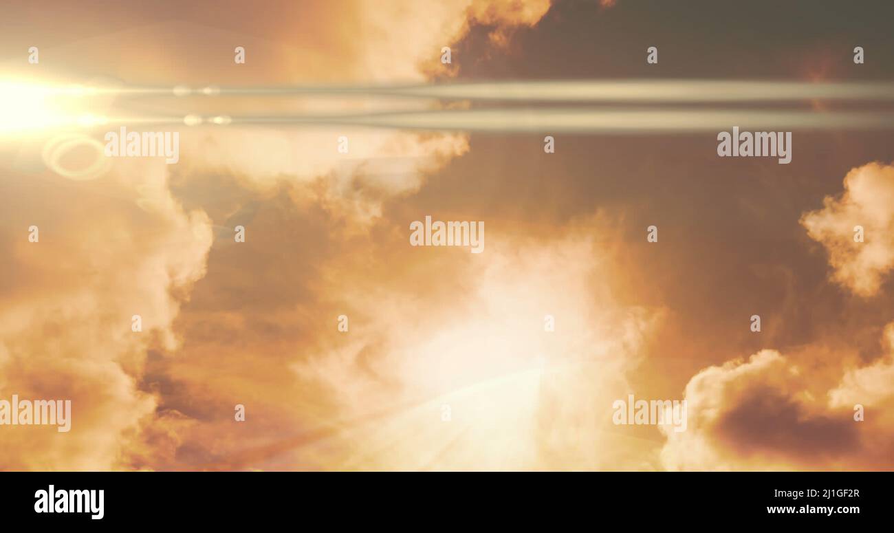 Image of bible over three christian crosses and orange clouds Stock Photo