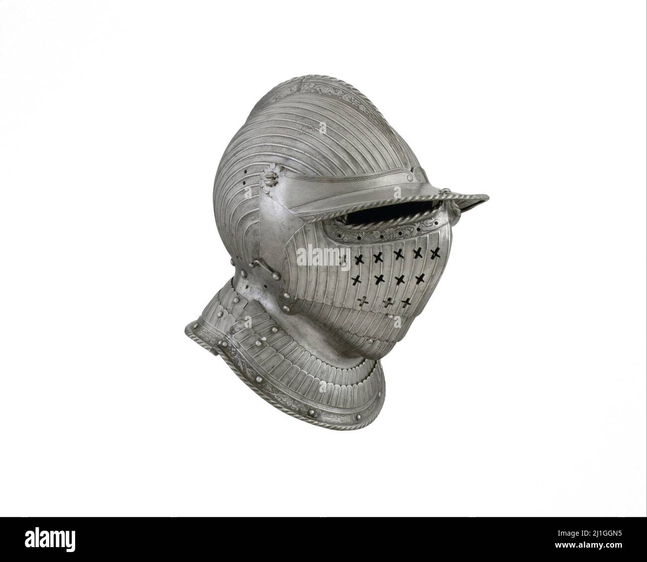 Vintage photo of medieval closed burgonet. ca. 1525–30. (With clipping path). This helmet combines features common to burgonets, notably the projectin Stock Photo