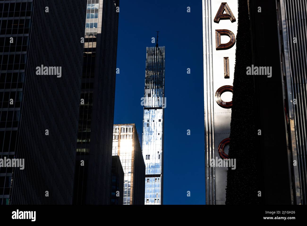 The sun illuminates the newly built luxury high-rise residential ...
