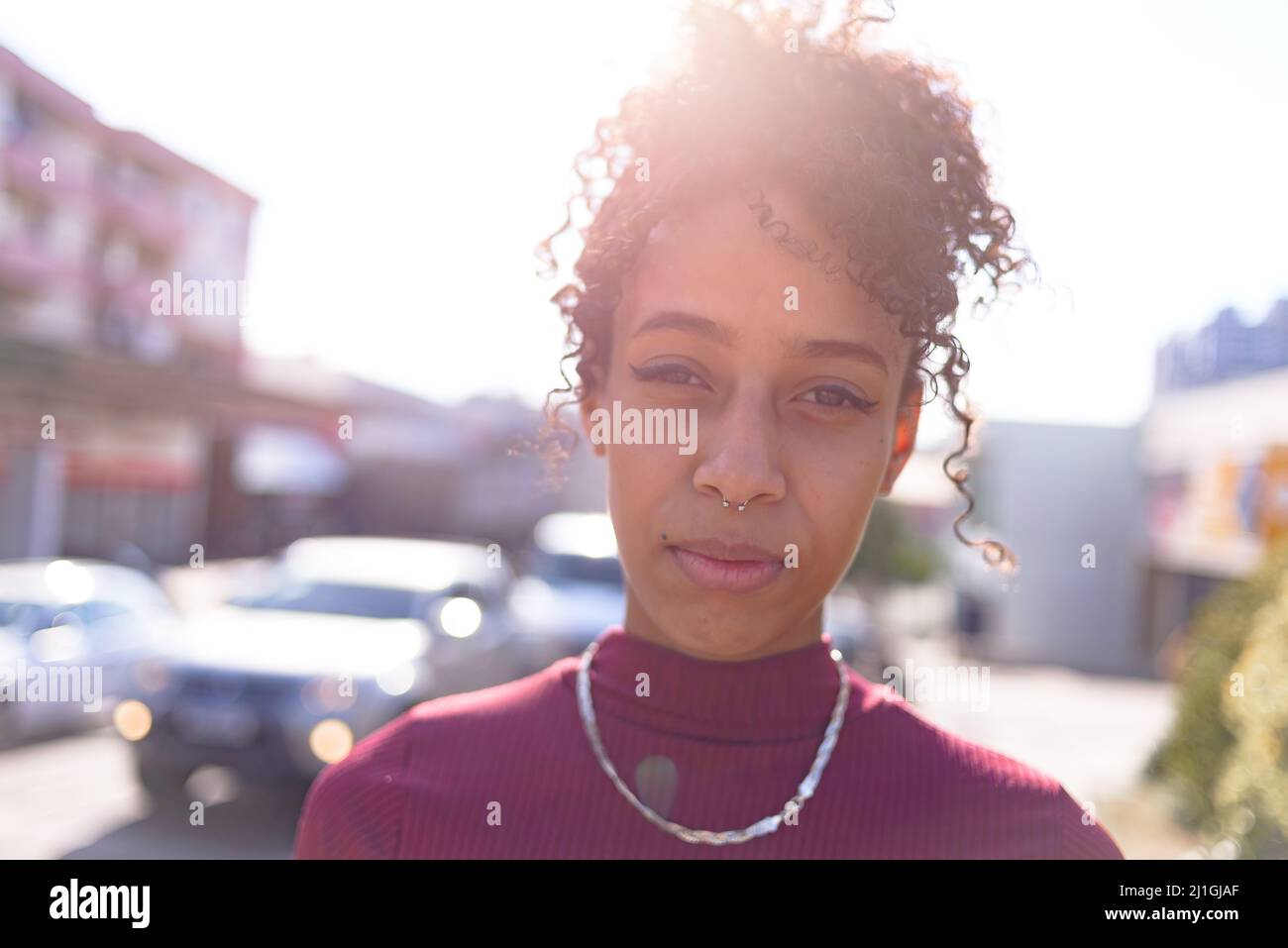 Young black woman portrait outdoors in urban background Stock Photo