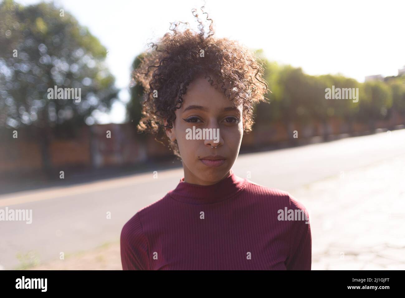 Young black woman portrait outdoors in urban background Stock Photo