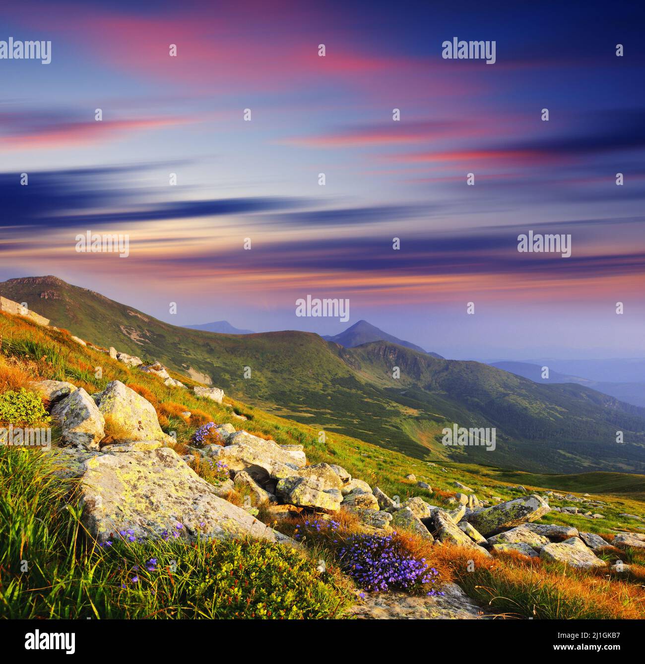 Majestic sunset in the mountains landscape. HDR image Stock Photo - Alamy