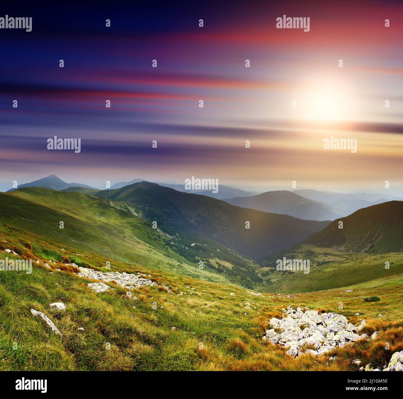 Majestic sunset in the mountains landscape. HDR image Stock Photo - Alamy