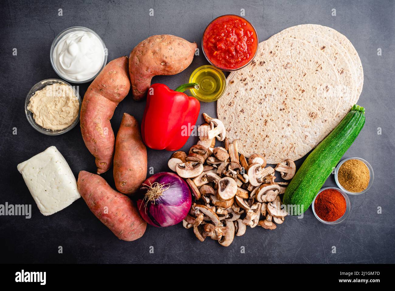Overhead View of Roasted Vegetable and Halloumi Wrap Ingredients Raw