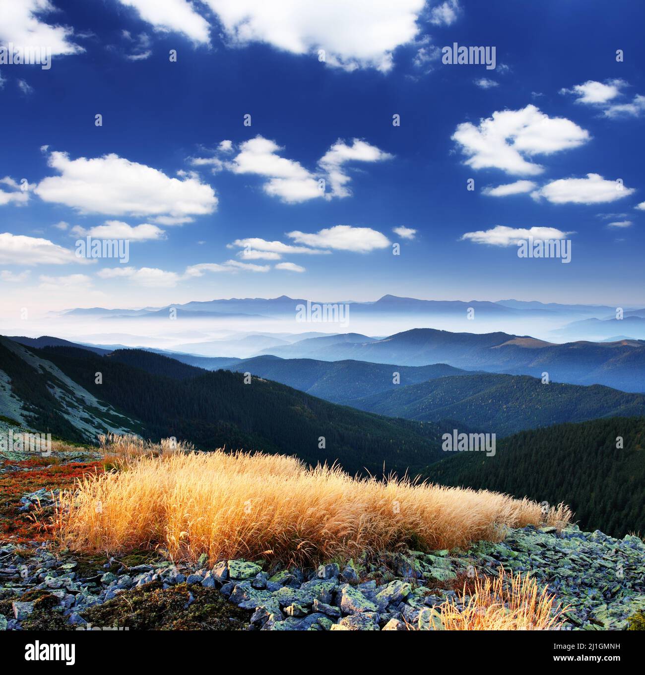 Beautiful mountains landscape and cloudy sky Stock Photo - Alamy