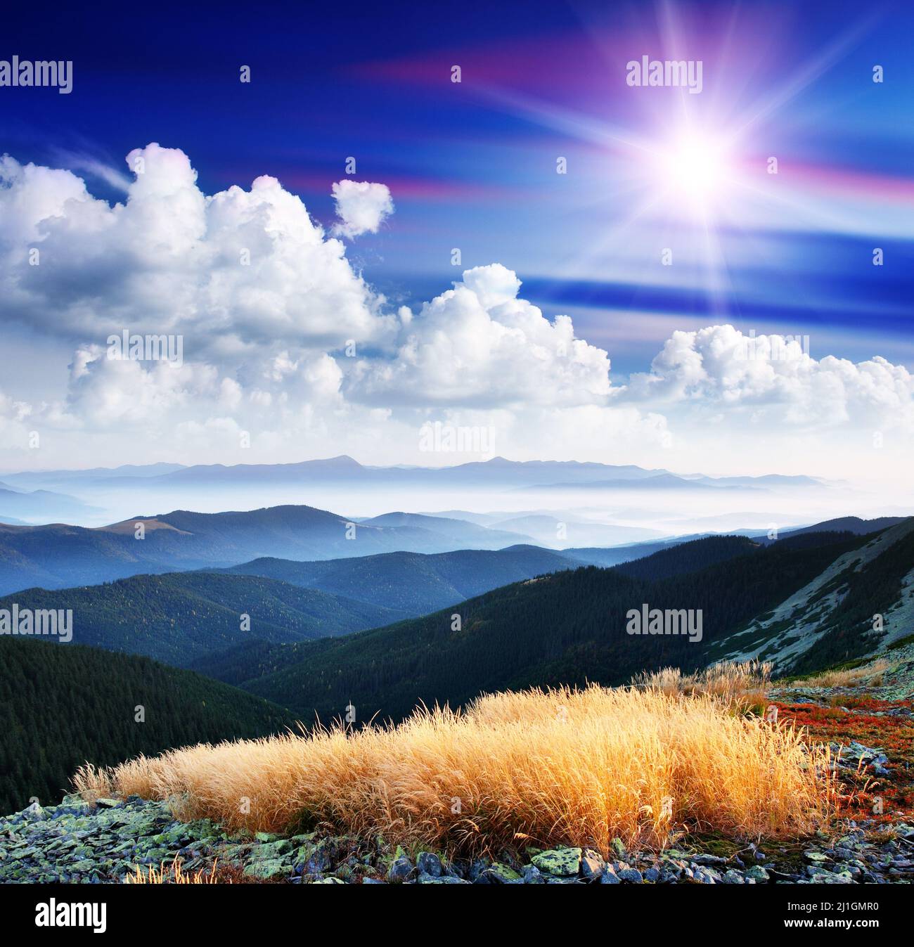 Beautiful mountains landscape and cloudy sky Stock Photo - Alamy